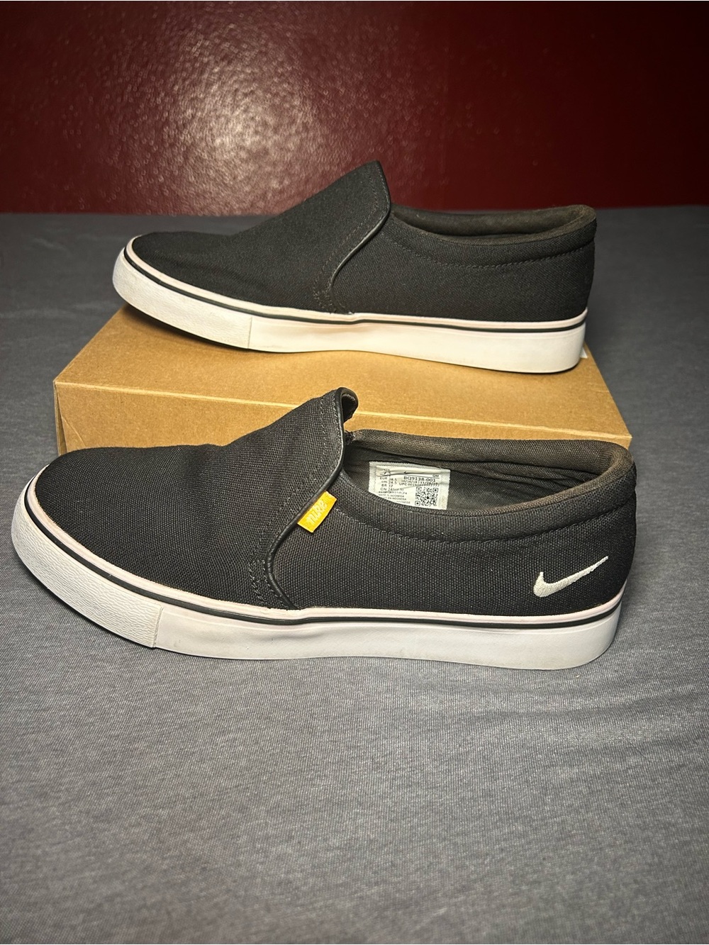 Nike Black Slip-On Canvas Skater Shoes with White Swoosh